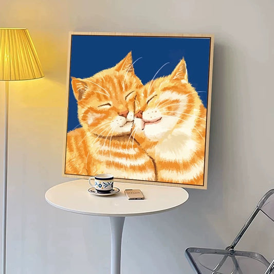 Orange cat kiss