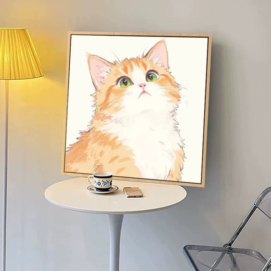 Orange cat looking up